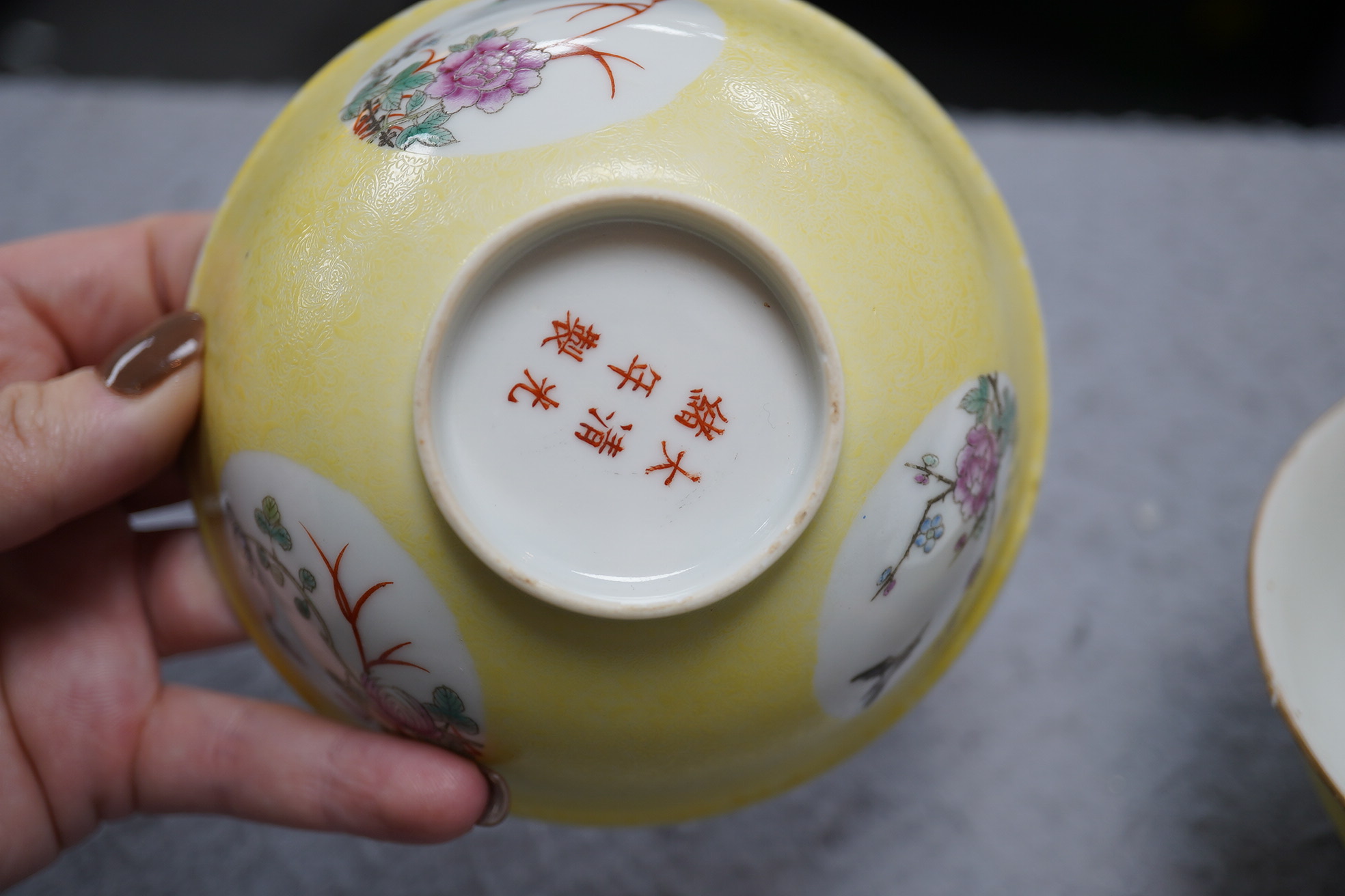 A pair of Chinese yellow sgraffito ground medallion bowls, Guangxu mark, early 20th century